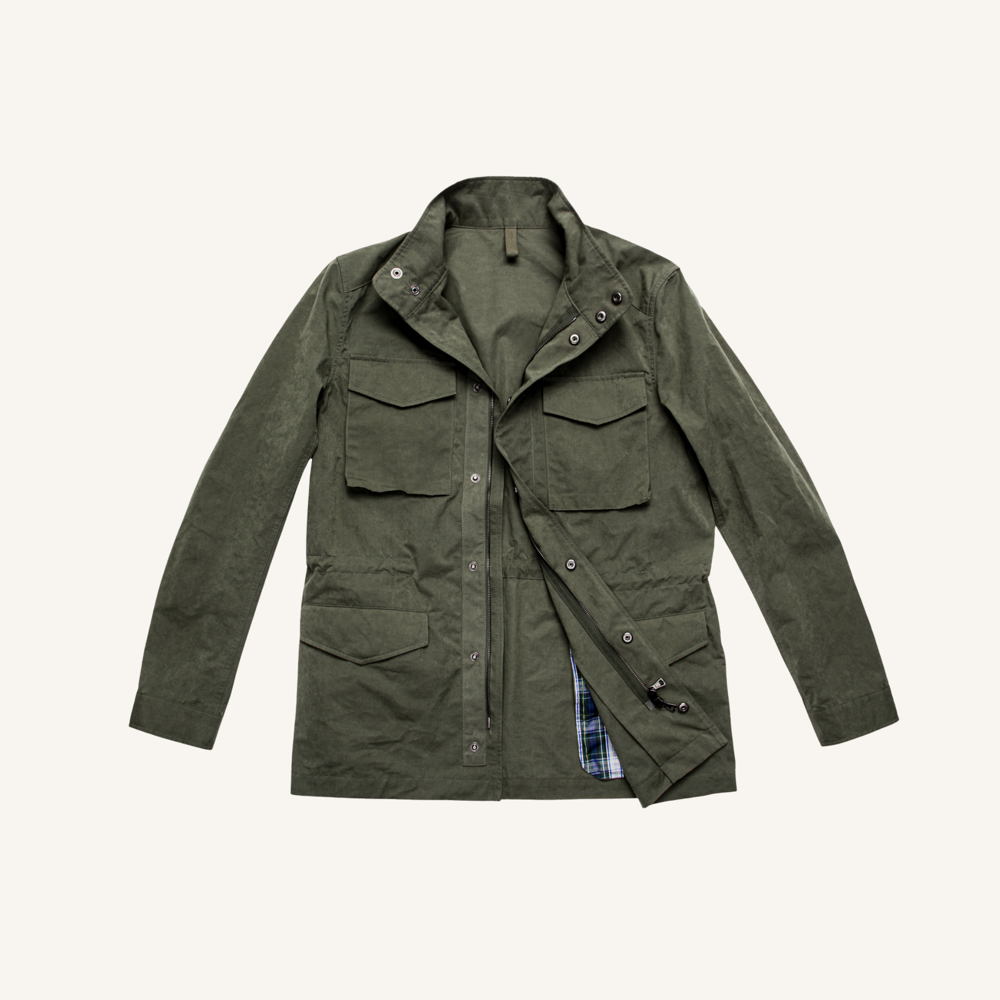 Green jacket with multiple pockets on a white background